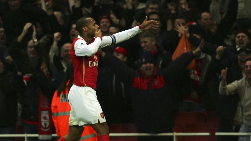 Thierry Henry celebrates a goal for the Gunners