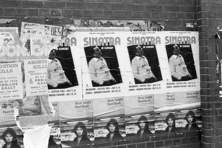 Black-and-white images of Frank Sinatra posters on Melbourne's Festival Hall.