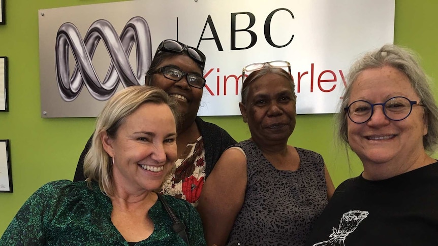 Lynne Hazelton and Gwen Knox and two Anne Street committee members standing in front of ABC Kimberley sign