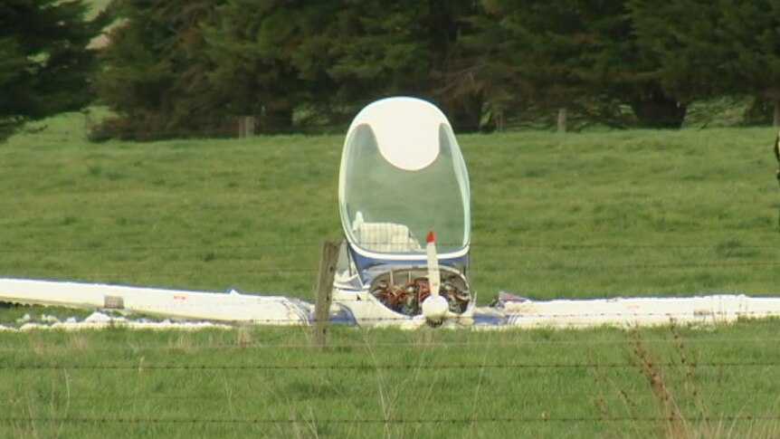 A crashed two seater glider on the ground at Clyde North.