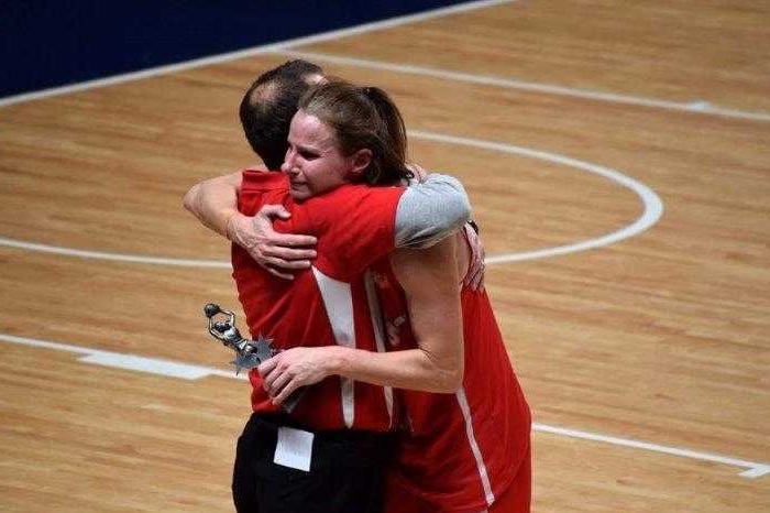 Jo Hill hugs coach Brenton Johnston after her last match