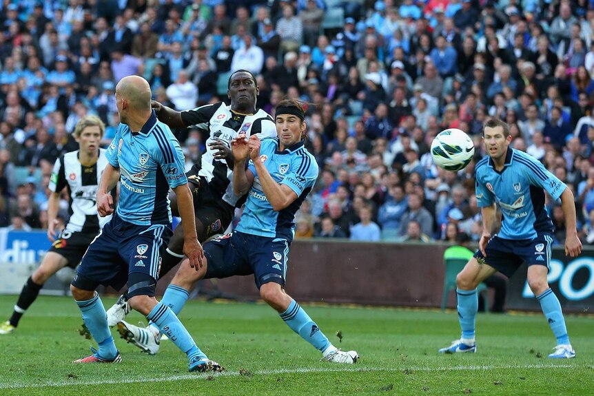 Game changer ... Heskey scores his first A-League goal against Sydney FC.