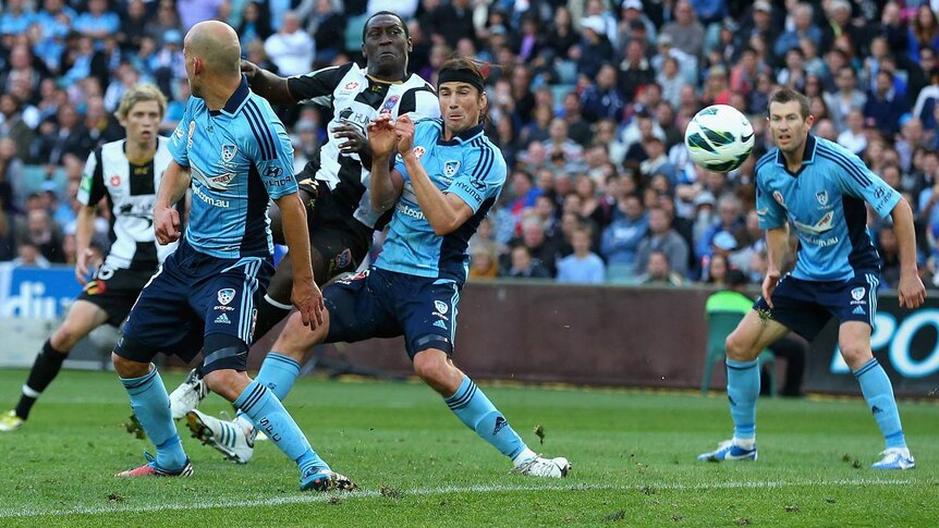 Emile Heskey fires in a volley to open his A-League account.