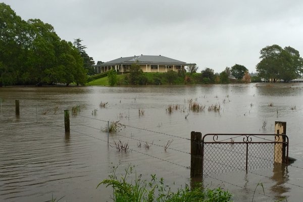 A home at Raymond Terrace surrounded by floodwaters