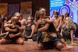 Women and children dance at the opening of the NAIDOC Women's Conference in Sydney