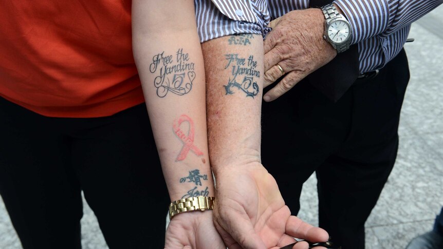 Alleged Yandina Five bikie group member Joshua Carew's wife and father-in-law show off tattoos