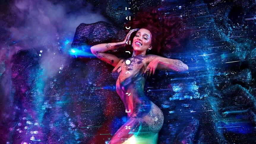 Image of Doja Cat looking ethereal on a space-like background.