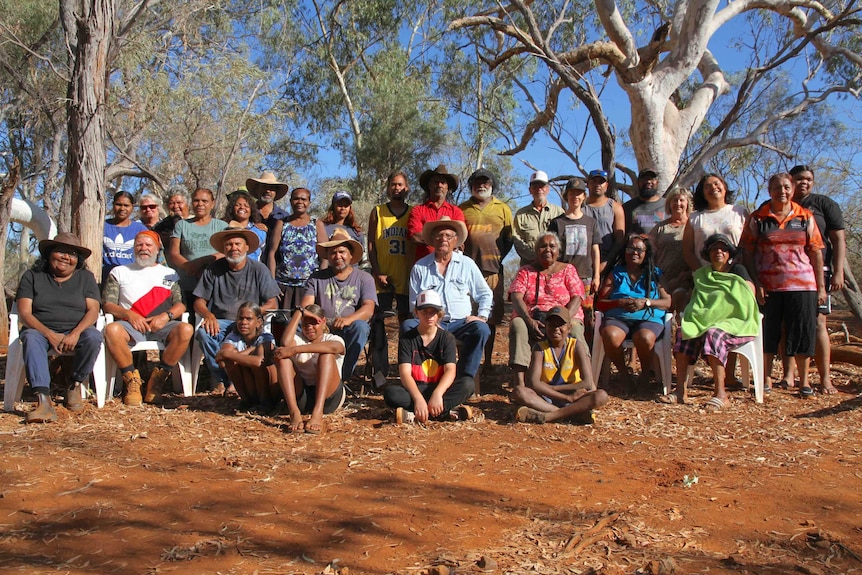 a group of people in the bush