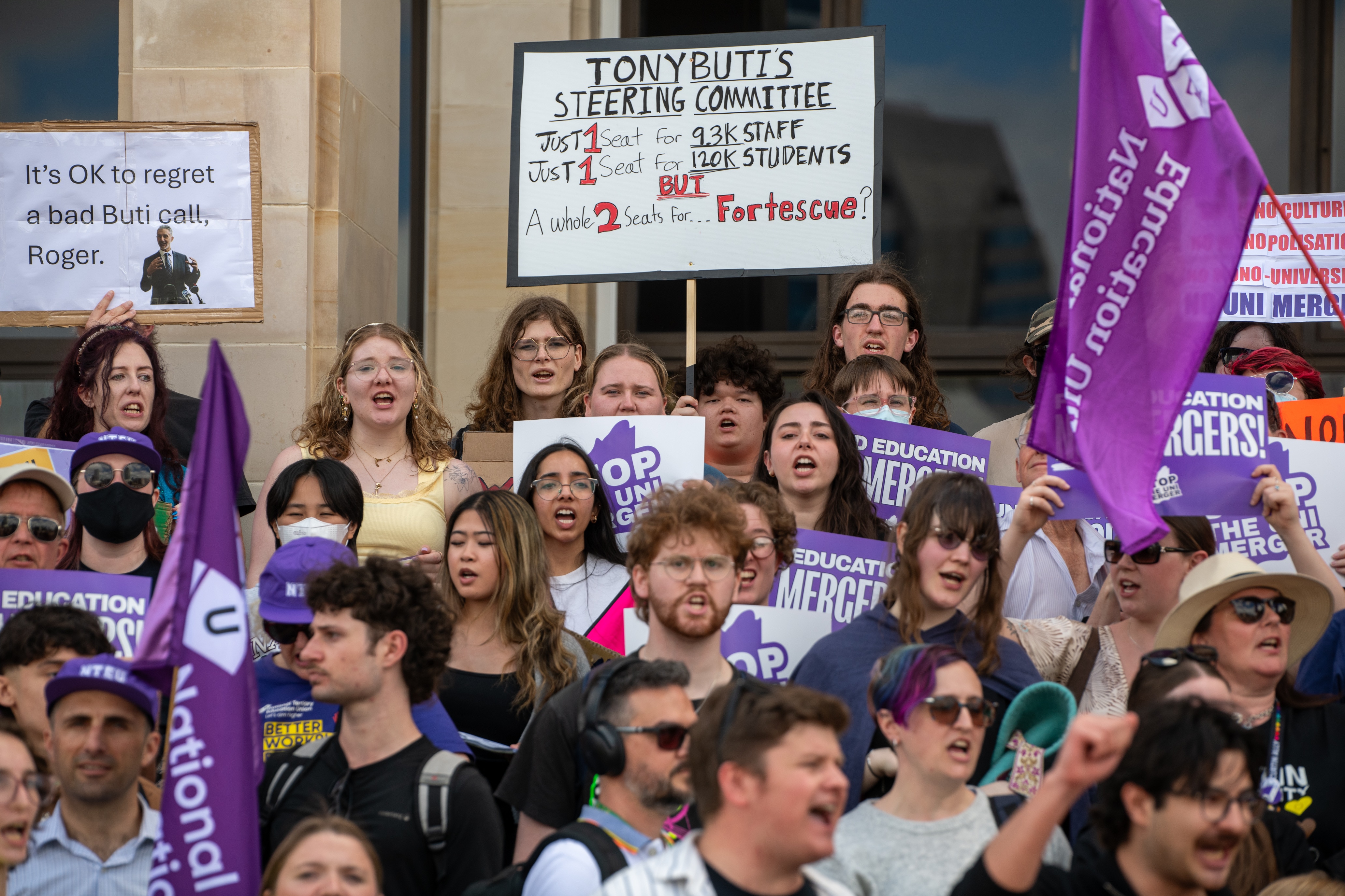 Hundreds rally at parliament against proposed university merger