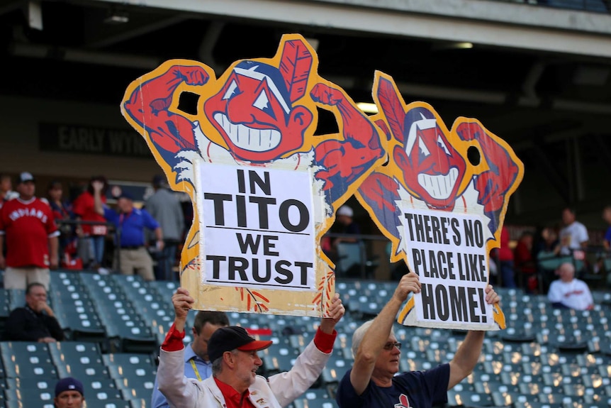 Cleveland Indian fans in 2016 with Chief Wahoo signs in support of coach Terry "Tito" Francona.