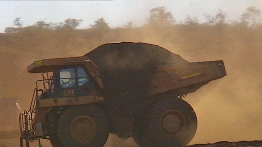 Iron ore truck shifting ore in the Pilbara
