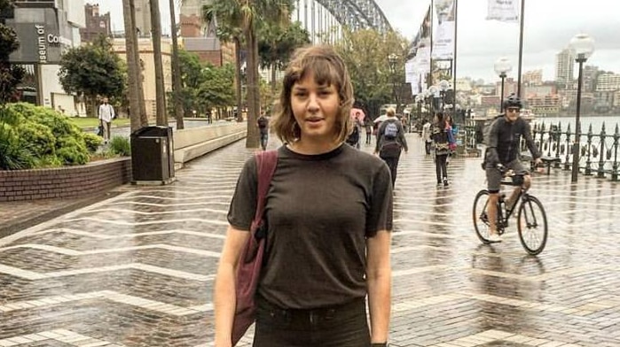 Candice Hedge poses in front of the Sydney Harbour Bridge