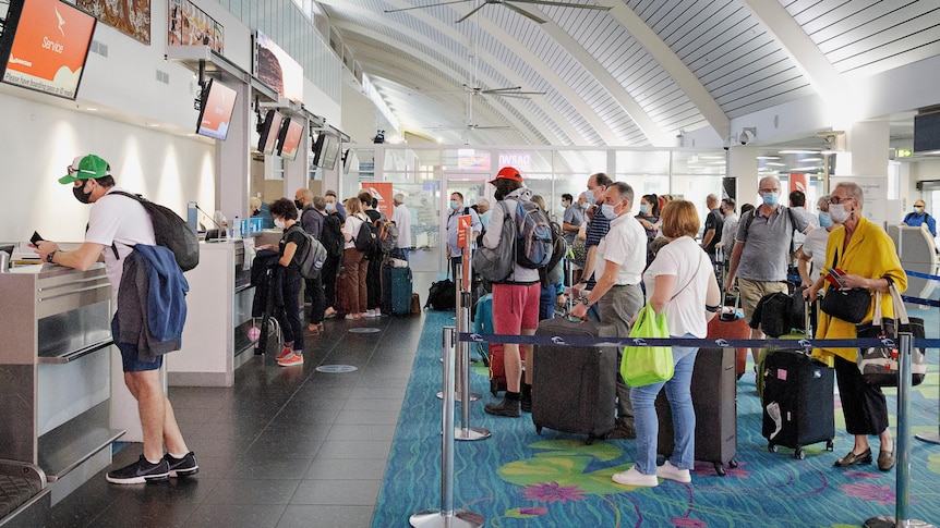 A long line at the Darwin Airport check-in counter during the COVID-19 lockdown.