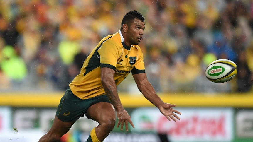 Starting 10 ... Kurtley Beale passes during the opening Bledisloe Cup Test