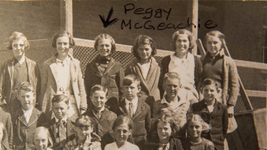 A school photo featuring Mrs Veale (top row, third from left).