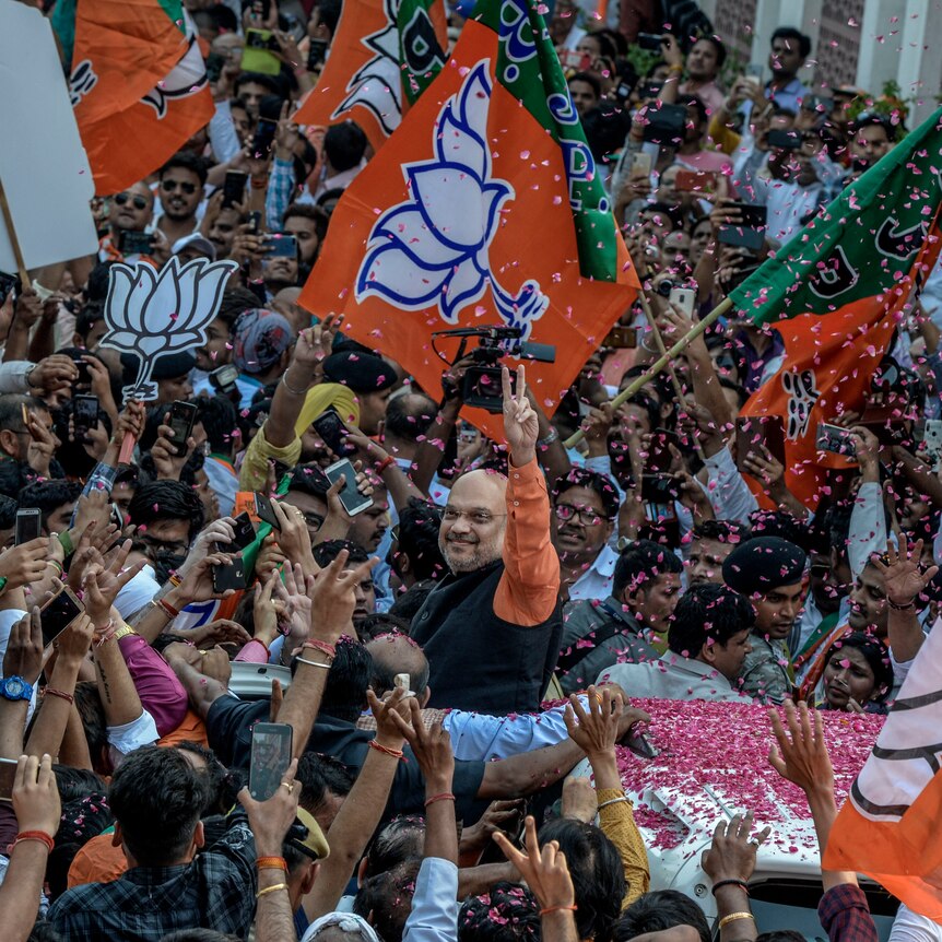 BJP president and Modi's right-hand man Amit Shah celebrating a BJP victory in 2019.