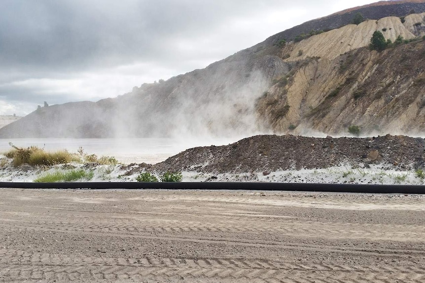 Fly ash blows around at Stanwell's Meandu coal mine in June 2016.
