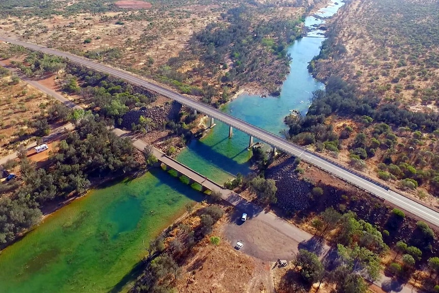 The Galena Bridge, which runs over the Murchison River and is surrounded by scrubland.