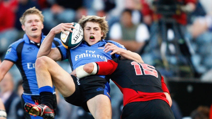 James O'Connor is rattled by Crusaders full-back Leon MacDonald.