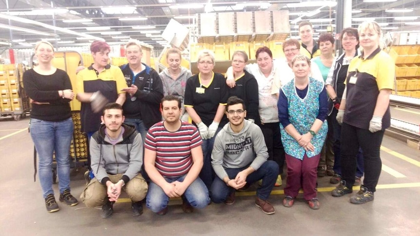 Deutsche Post DHL Group mail-sorting team