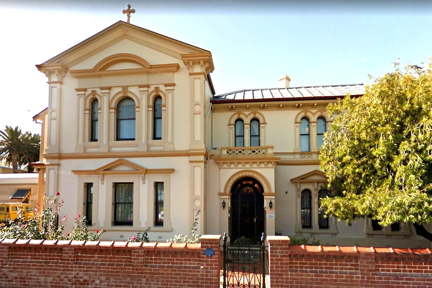 Adelaide's Archbishop's House on a sunny day.