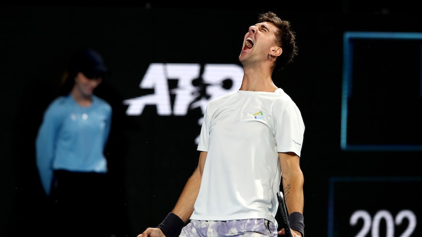 Thanasi Kokkinakis celebrates by screaming after defeating Marin Cilic at the Adelaide International  