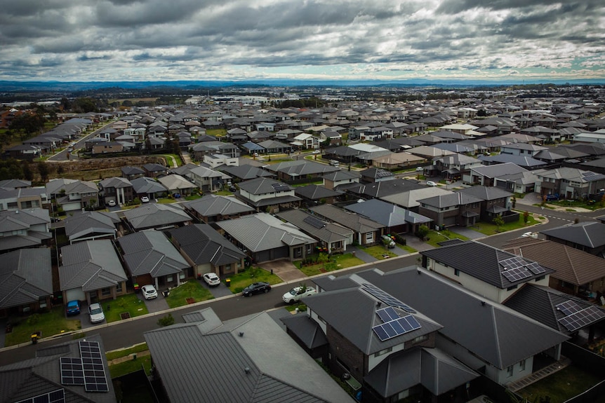 The suburb of Gregory Hills in an aerial shot on a cloudy day