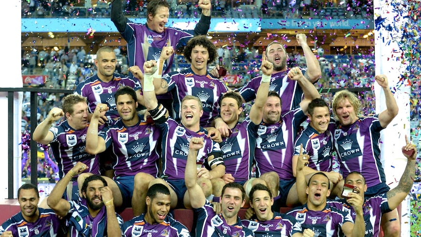The Melbourne Storm celebrate their 14-4 grand final win over the Canterbury-Bankstown Bulldogs.