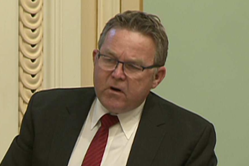 A man speaking in Queensland Parliament