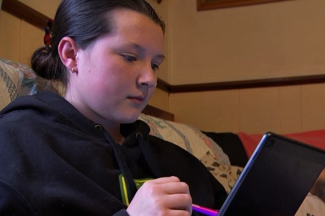 Emily has hearing loss and audio processing disorder, which affects her learning. 
