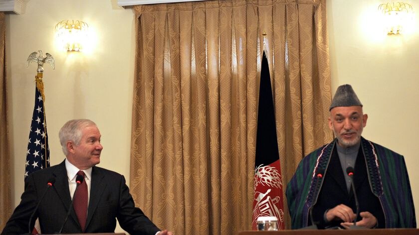 Gates in talks with Karzai