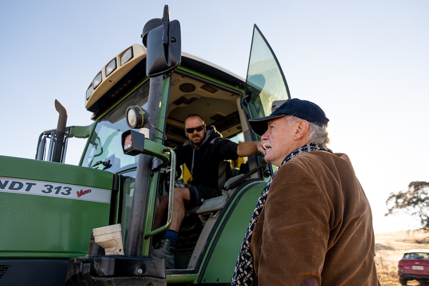 John Geber and a worker