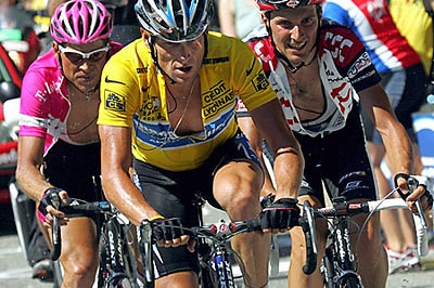 Lance Armstrong is tailed by Jan Ullrich and Ivan Basso during stage 14 of the 2005 Tour de France (AFP)