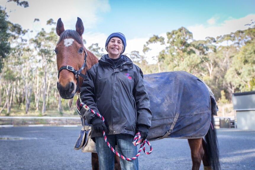 Julia Clark has been helping people with disabilities onto horses such as Buddy.