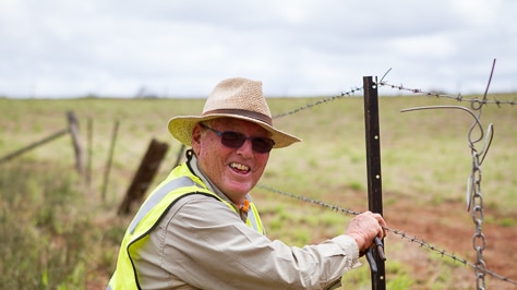 BlazAid volunteer Dennis Bishop working on a fence.