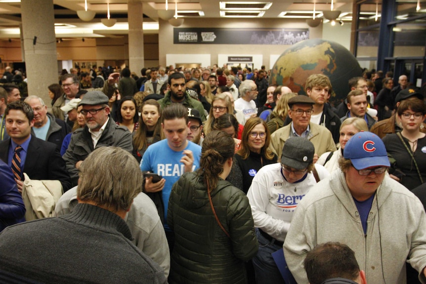 People gather for caucus at the Iowa State Historical Society in Des Moines, Iowa February 1, 2016