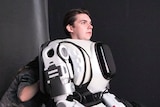 A man in the Alyosha robot suit, built by Show Robots.