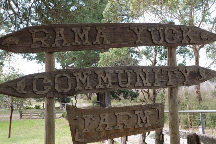 Old wooden Ramahyuck Community Farm sign 