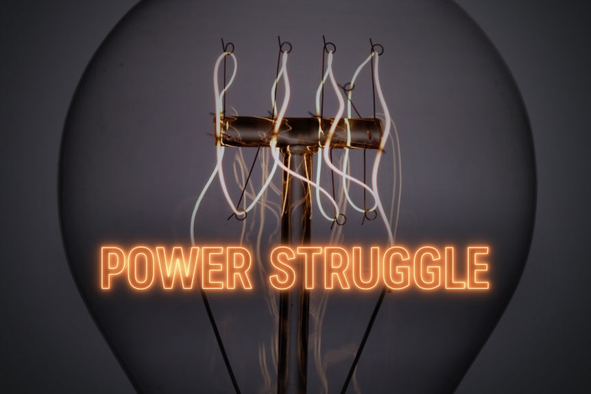 A close-up of an incandescent light-bulb with the word "POWER STRUGGLE" superimposed on it.