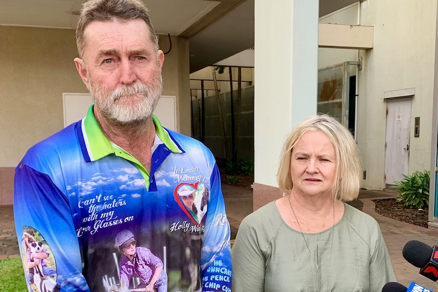Warren and Elle Brown, parents of Holly Brown, stand outside court in Cairns in far north Queensland on June 12, 2019.