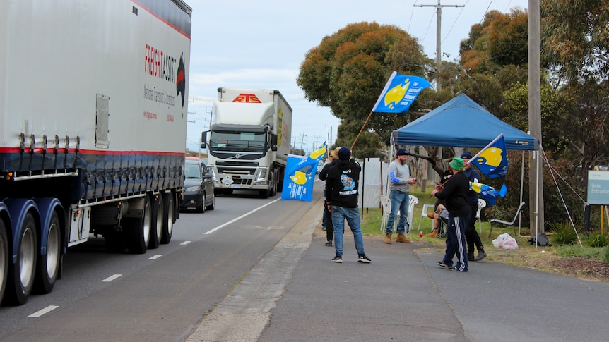 A protest at the side of a road