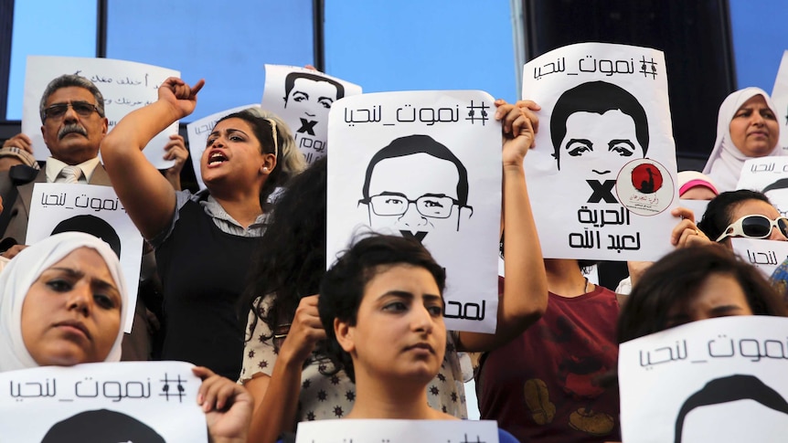 Protesters rally in support of Al Jazeera journalists