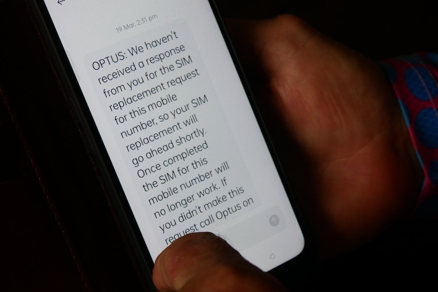 A text that reads OPTUS: We haven't received a response from you for the SIM replacement request for this mobile. 