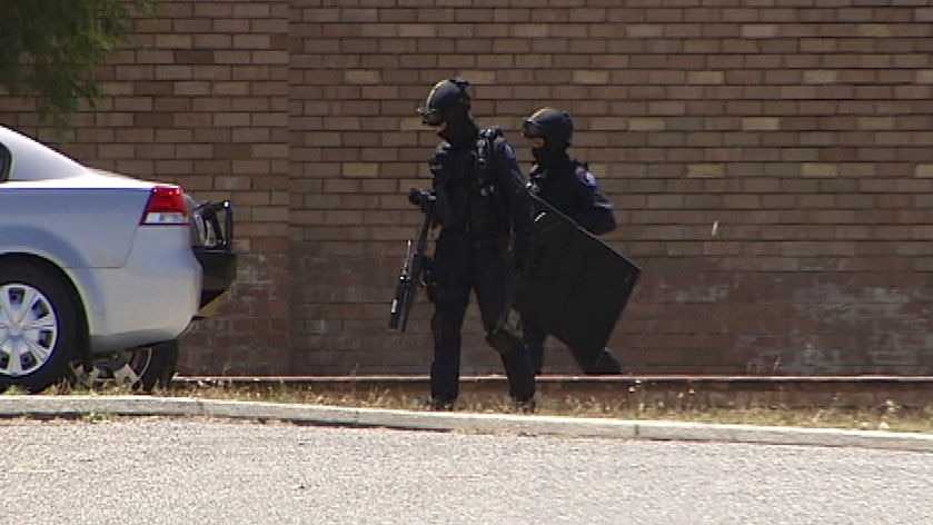 TRG officers at the scene of a siege at South Lake.