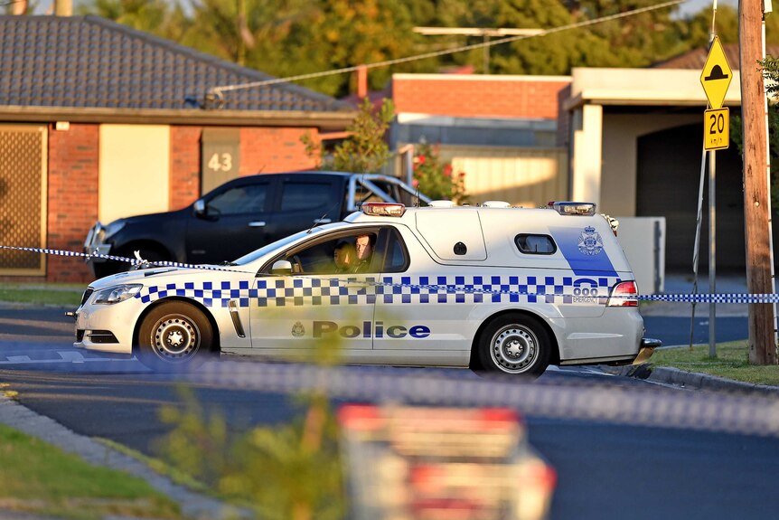 Police cordon off street after Melbourne stabbing