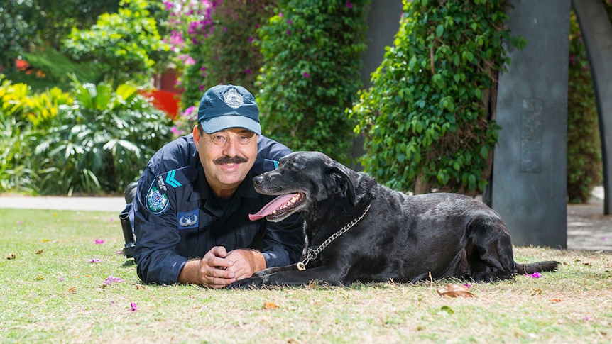 Author Nigel Allsopp and Queensland Police detection dog Venus