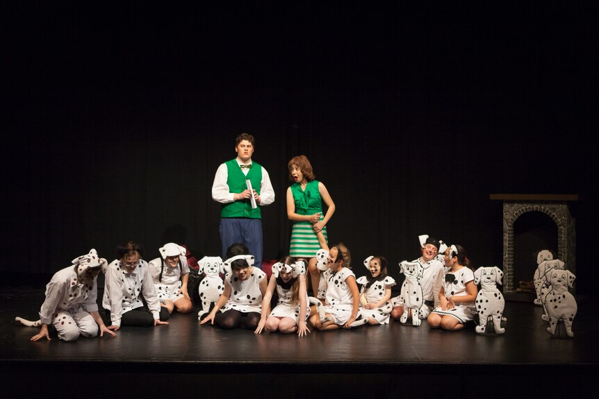 A stage play with children dressed up as dalmatians