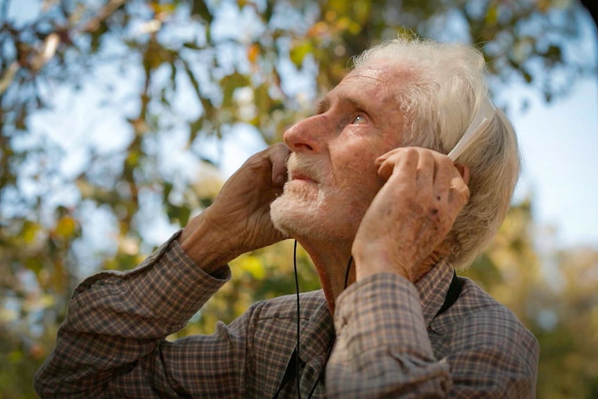 Field recordist John Hutchinson listens to birdsong