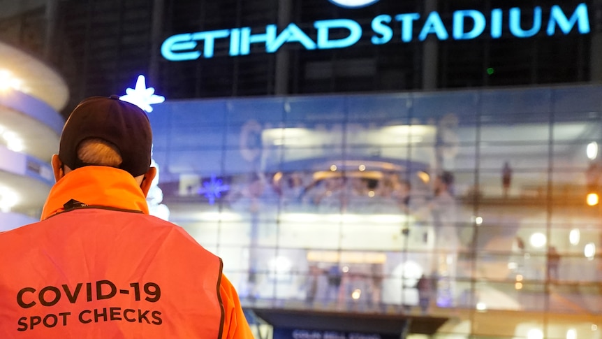 Steward does COVID spot-check before Manchester City game