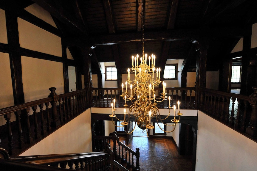 A chandelier hangs over a lofted main entryway of the main house inside Michael Jackson's Neverland Ranch